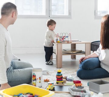 Family playing together home 360x320
